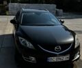 Черный Мазда 6, объемом двигателя 2 л и пробегом 299 тыс. км за 4207 $, фото 1 на Automoto.ua