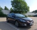 Черный Мазда 6, объемом двигателя 2 л и пробегом 122 тыс. км за 9900 $, фото 1 на Automoto.ua