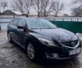 Черный Мазда 6, объемом двигателя 1.8 л и пробегом 300 тыс. км за 6000 $, фото 1 на Automoto.ua