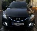 Черный Мазда 6, объемом двигателя 2 л и пробегом 230 тыс. км за 7499 $, фото 1 на Automoto.ua