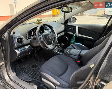 Черный Мазда 6, объемом двигателя 2 л и пробегом 232 тыс. км за 6600 $, фото 8 на Automoto.ua