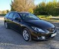 Черный Мазда 6, объемом двигателя 2 л и пробегом 200 тыс. км за 7500 $, фото 1 на Automoto.ua