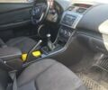 Черный Мазда 6, объемом двигателя 2 л и пробегом 315 тыс. км за 6500 $, фото 1 на Automoto.ua