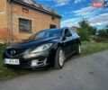 Черный Мазда 6, объемом двигателя 2 л и пробегом 246 тыс. км за 5500 $, фото 1 на Automoto.ua
