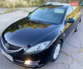 Черный Мазда 6, объемом двигателя 2 л и пробегом 287 тыс. км за 6299 $, фото 1 на Automoto.ua