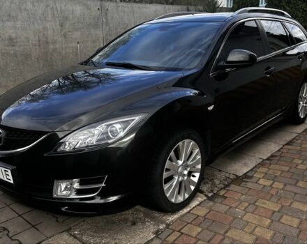 Черный Мазда 6, объемом двигателя 2 л и пробегом 230 тыс. км за 7499 $, фото 1 на Automoto.ua
