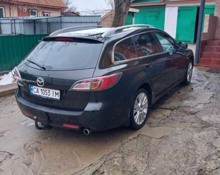 Черный Мазда 6, объемом двигателя 1.8 л и пробегом 300 тыс. км за 6000 $, фото 3 на Automoto.ua