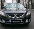 Черный Мазда 6, объемом двигателя 2 л и пробегом 255 тыс. км за 8000 $, фото 1 на Automoto.ua