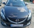 Черный Мазда 6, объемом двигателя 2 л и пробегом 247 тыс. км за 7501 $, фото 1 на Automoto.ua