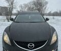 Черный Мазда 6, объемом двигателя 2 л и пробегом 210 тыс. км за 6400 $, фото 1 на Automoto.ua