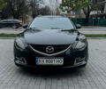 Черный Мазда 6, объемом двигателя 2 л и пробегом 235 тыс. км за 9200 $, фото 1 на Automoto.ua