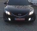 Черный Мазда 6, объемом двигателя 2.2 л и пробегом 235 тыс. км за 7220 $, фото 1 на Automoto.ua