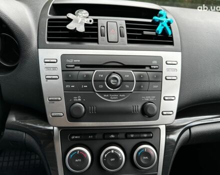 Черный Мазда 6, объемом двигателя 2.2 л и пробегом 214 тыс. км за 7990 $, фото 14 на Automoto.ua