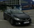 Черный Мазда 6, объемом двигателя 2 л и пробегом 327 тыс. км за 5500 $, фото 1 на Automoto.ua
