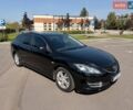 Черный Мазда 6, объемом двигателя 1.8 л и пробегом 250 тыс. км за 4999 $, фото 1 на Automoto.ua
