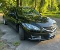 Черный Мазда 6, объемом двигателя 1.8 л и пробегом 226 тыс. км за 5400 $, фото 1 на Automoto.ua
