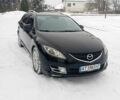 Черный Мазда 6, объемом двигателя 2 л и пробегом 244 тыс. км за 6100 $, фото 1 на Automoto.ua