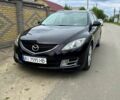 Черный Мазда 6, объемом двигателя 2 л и пробегом 175 тыс. км за 7200 $, фото 1 на Automoto.ua