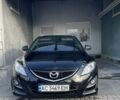 Черный Мазда 6, объемом двигателя 2.18 л и пробегом 215 тыс. км за 7100 $, фото 1 на Automoto.ua