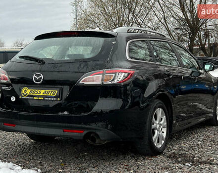Чорний Мазда 6, об'ємом двигуна 1.8 л та пробігом 190 тис. км за 7800 $, фото 5 на Automoto.ua