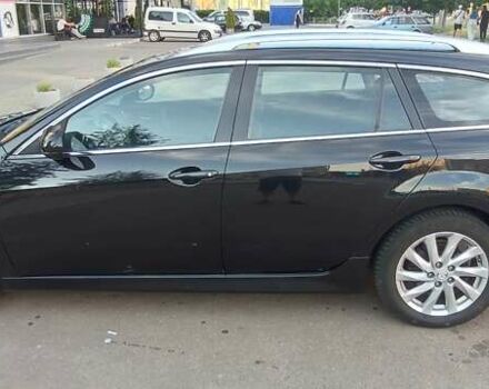 Черный Мазда 6, объемом двигателя 2.18 л и пробегом 307 тыс. км за 7350 $, фото 1 на Automoto.ua