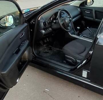 Черный Мазда 6, объемом двигателя 2.18 л и пробегом 307 тыс. км за 7350 $, фото 6 на Automoto.ua