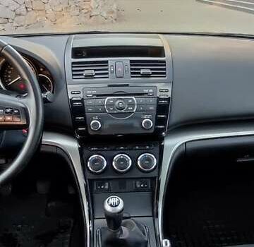 Черный Мазда 6, объемом двигателя 2.18 л и пробегом 307 тыс. км за 7350 $, фото 9 на Automoto.ua