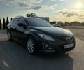 Черный Мазда 6, объемом двигателя 2.2 л и пробегом 304 тыс. км за 7500 $, фото 1 на Automoto.ua
