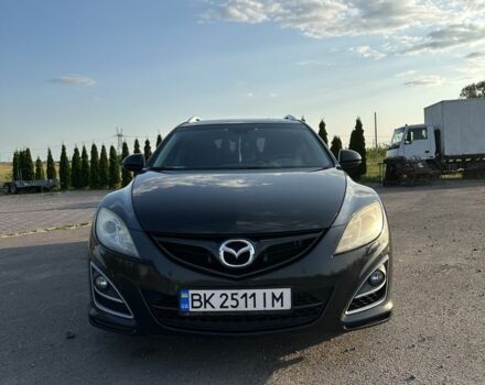 Черный Мазда 6, объемом двигателя 2.2 л и пробегом 304 тыс. км за 7500 $, фото 1 на Automoto.ua