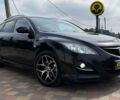 Черный Мазда 6, объемом двигателя 2.2 л и пробегом 286 тыс. км за 7200 $, фото 1 на Automoto.ua