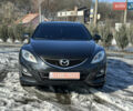 Черный Мазда 6, объемом двигателя 2 л и пробегом 250 тыс. км за 8900 $, фото 1 на Automoto.ua