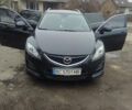 Черный Мазда 6, объемом двигателя 2.2 л и пробегом 305 тыс. км за 7200 $, фото 1 на Automoto.ua