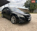 Чорний Мазда 6, об'ємом двигуна 2.18 л та пробігом 321 тис. км за 7000 $, фото 6 на Automoto.ua