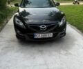 Черный Мазда 6, объемом двигателя 2.18 л и пробегом 303 тыс. км за 6500 $, фото 1 на Automoto.ua
