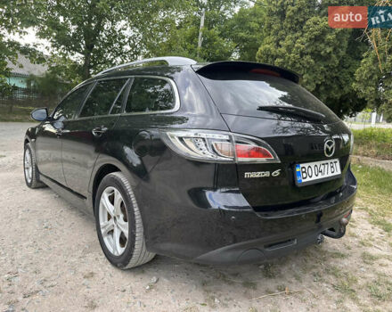 Черный Мазда 6, объемом двигателя 2.18 л и пробегом 321 тыс. км за 6400 $, фото 1 на Automoto.ua