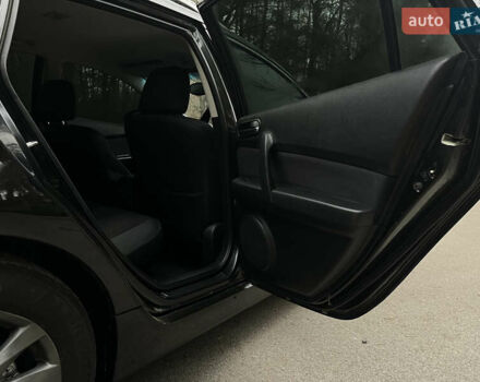 Черный Мазда 6, объемом двигателя 2.18 л и пробегом 234 тыс. км за 6850 $, фото 10 на Automoto.ua