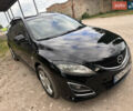 Чорний Мазда 6, об'ємом двигуна 2.18 л та пробігом 321 тис. км за 7000 $, фото 5 на Automoto.ua