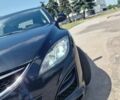 Черный Мазда 6, объемом двигателя 2.18 л и пробегом 250 тыс. км за 7500 $, фото 1 на Automoto.ua