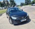 Черный Мазда 6, объемом двигателя 2.18 л и пробегом 250 тыс. км за 7500 $, фото 1 на Automoto.ua
