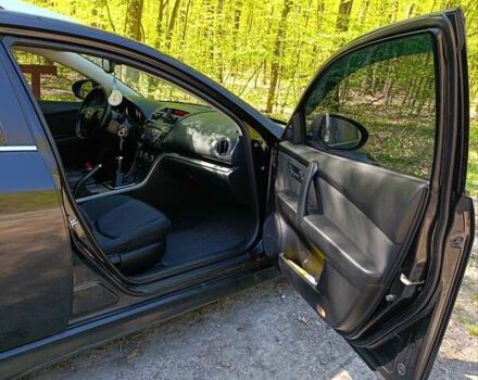 Черный Мазда 6, объемом двигателя 2.18 л и пробегом 282 тыс. км за 7600 $, фото 10 на Automoto.ua