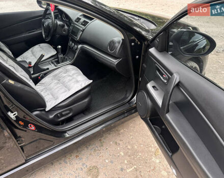 Черный Мазда 6, объемом двигателя 2.18 л и пробегом 321 тыс. км за 6400 $, фото 20 на Automoto.ua