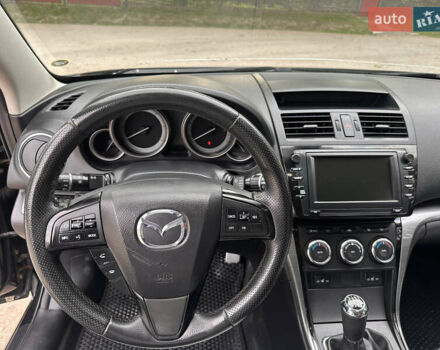Черный Мазда 6, объемом двигателя 2.18 л и пробегом 321 тыс. км за 6400 $, фото 16 на Automoto.ua