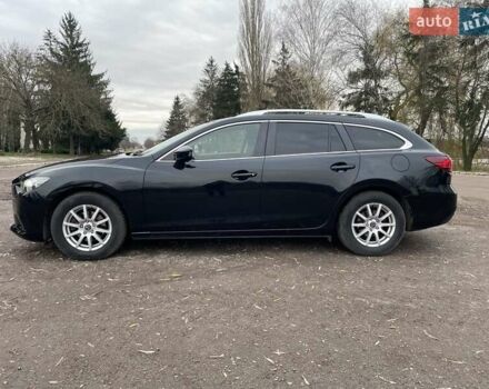Черный Мазда 6, объемом двигателя 2.18 л и пробегом 240 тыс. км за 9500 $, фото 1 на Automoto.ua
