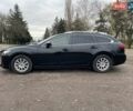 Черный Мазда 6, объемом двигателя 2.18 л и пробегом 240 тыс. км за 9500 $, фото 1 на Automoto.ua
