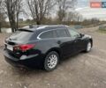 Черный Мазда 6, объемом двигателя 2.18 л и пробегом 240 тыс. км за 9500 $, фото 7 на Automoto.ua