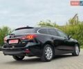 Черный Мазда 6, объемом двигателя 2.2 л и пробегом 257 тыс. км за 9850 $, фото 1 на Automoto.ua