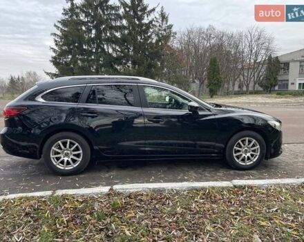 Черный Мазда 6, объемом двигателя 2.18 л и пробегом 240 тыс. км за 9500 $, фото 9 на Automoto.ua