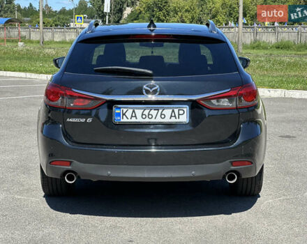Чорний Мазда 6, об'ємом двигуна 2.19 л та пробігом 220 тис. км за 11900 $, фото 4 на Automoto.ua