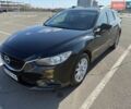 Черный Мазда 6, объемом двигателя 2.19 л и пробегом 234 тыс. км за 11000 $, фото 1 на Automoto.ua