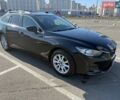 Черный Мазда 6, объемом двигателя 2.19 л и пробегом 234 тыс. км за 11000 $, фото 2 на Automoto.ua